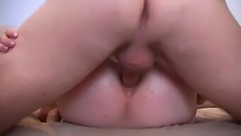 A Threesome With A Couple And A Mature Woman Engaging In Anal Play