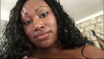 A Stunning Ebony Curvy Woman With Large Breasts Penetrated By A Black Cock