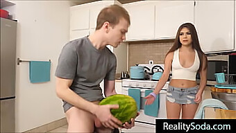 Family Fun: Brother And Sister Get Frisky Over A Fruit