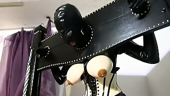 Bdsm Lovers In Rubber Suits Engage In Rough Sex And Humiliation